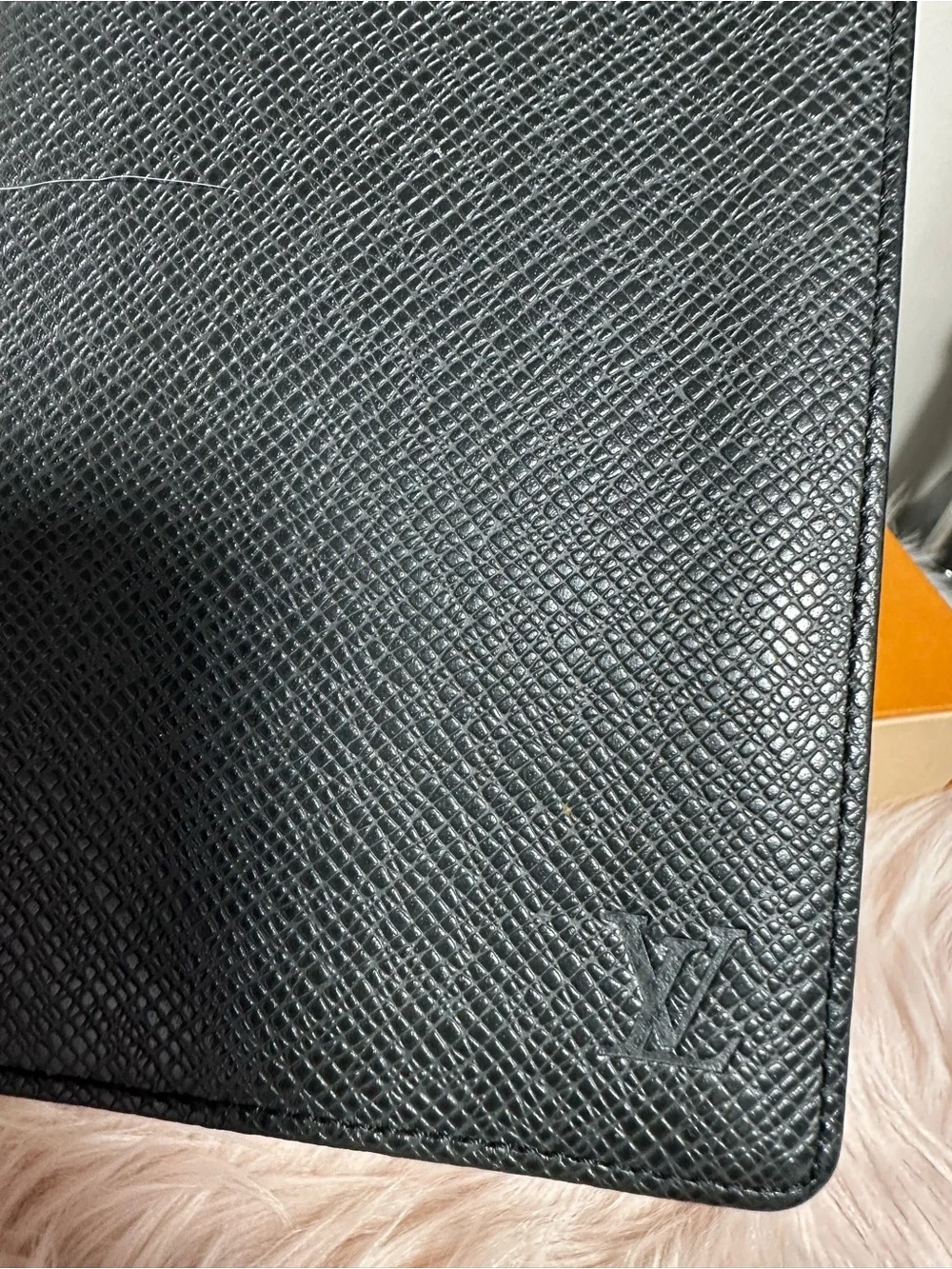 Louis Vuitton bifold wallet in Taiga Leather